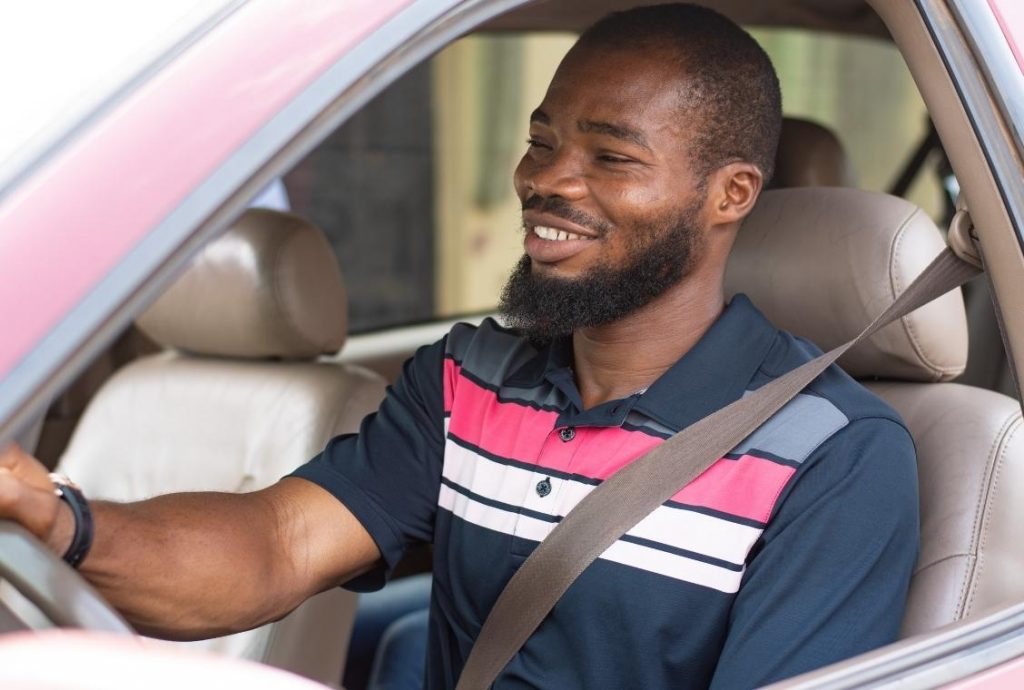 Male driving car