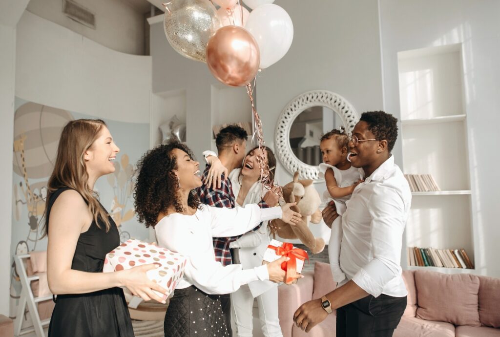 A bunch of people gathering for a celebration.